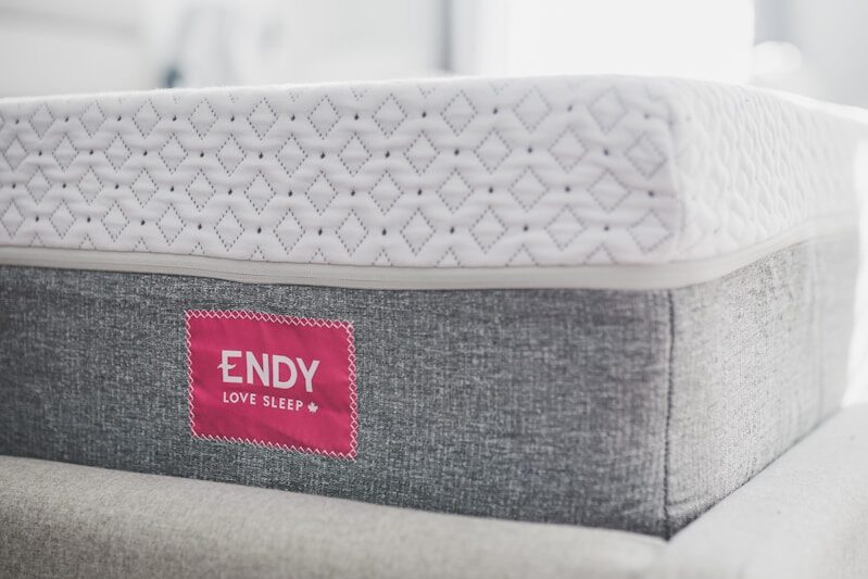 a close up of a mattress on a couch