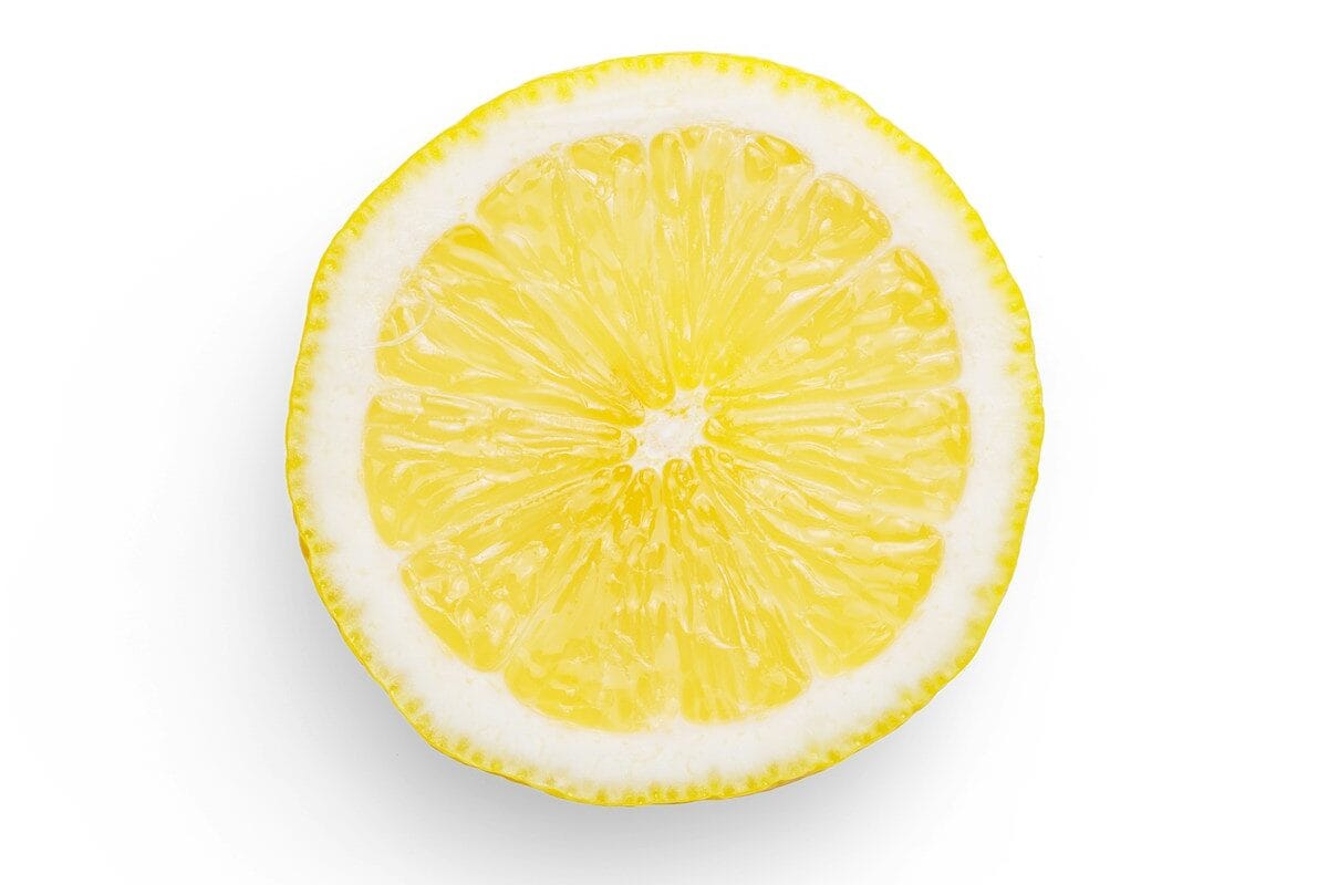 sliced lemon on white background